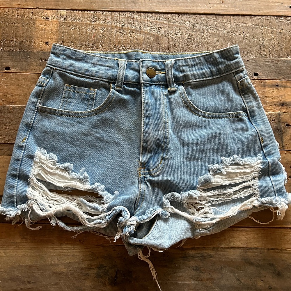 Ripped high rise denim shorts